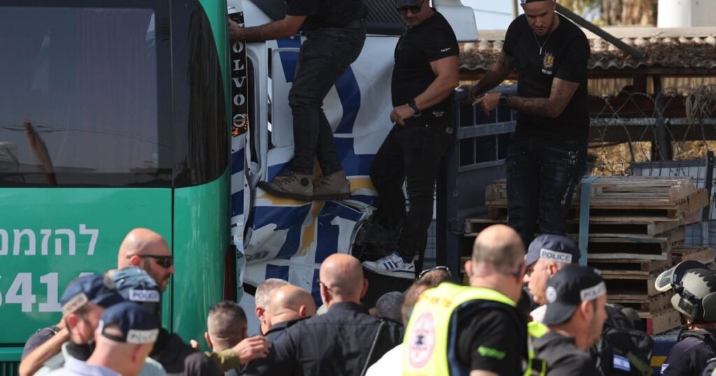 Dozens killed and injured in 'truck ram' at bus stop near Tel Aviv