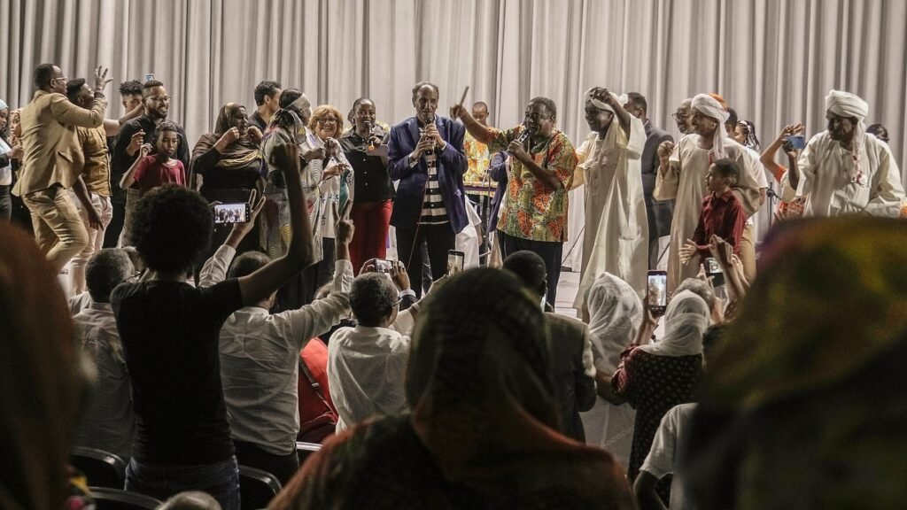 Sudanese performers bring refugee audience home with music and dance